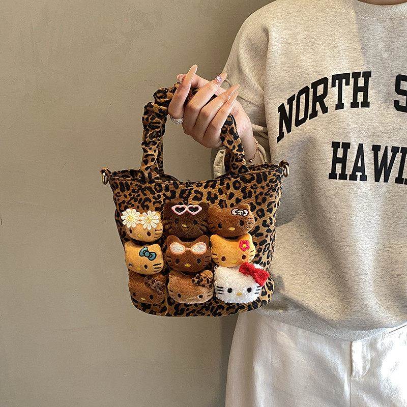 日本正版Kitty手提水桶包女2025新款秋冬百搭斜挎包可爱小拎包潮