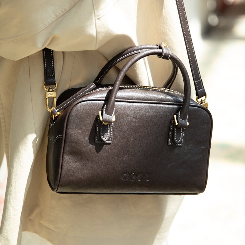 欧米OMI女包2025新款时尚百搭手提包时尚牛皮小众设计单肩斜挎包