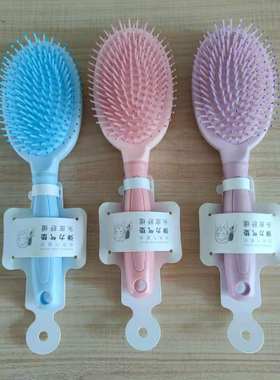 名创优品圆形按摩梳子miniso