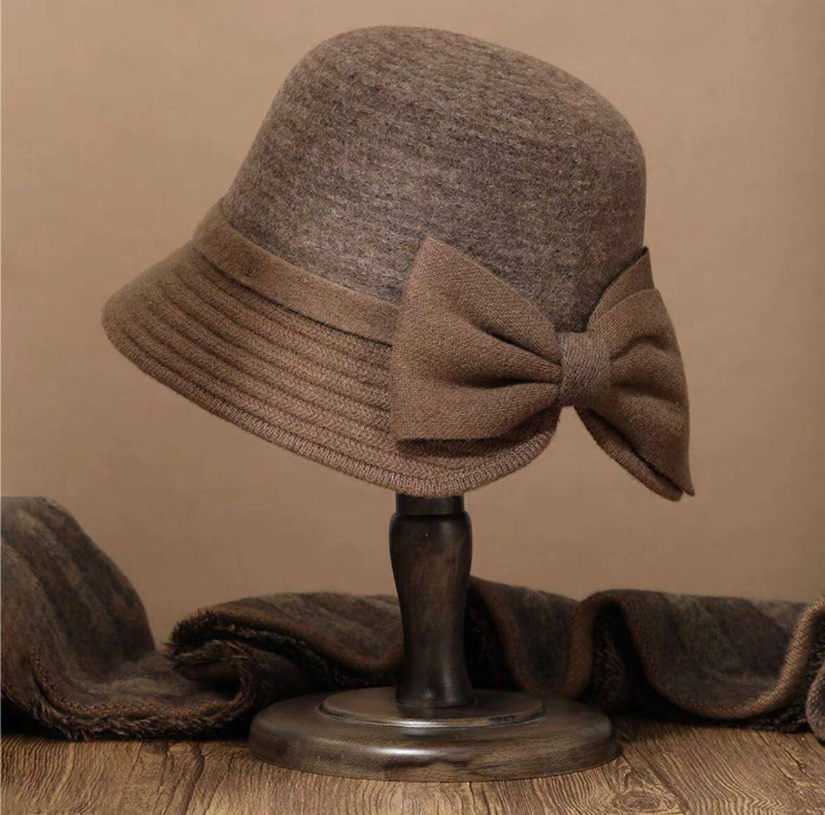 秋冬季新款蝴蝶结羊毛渔夫帽子女时尚百搭洋气中老年保暖圆顶盆帽