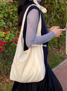 Wfei复古日韩慵懒风简约休闲单肩背心包白色打结百搭帆布袋斜挎包