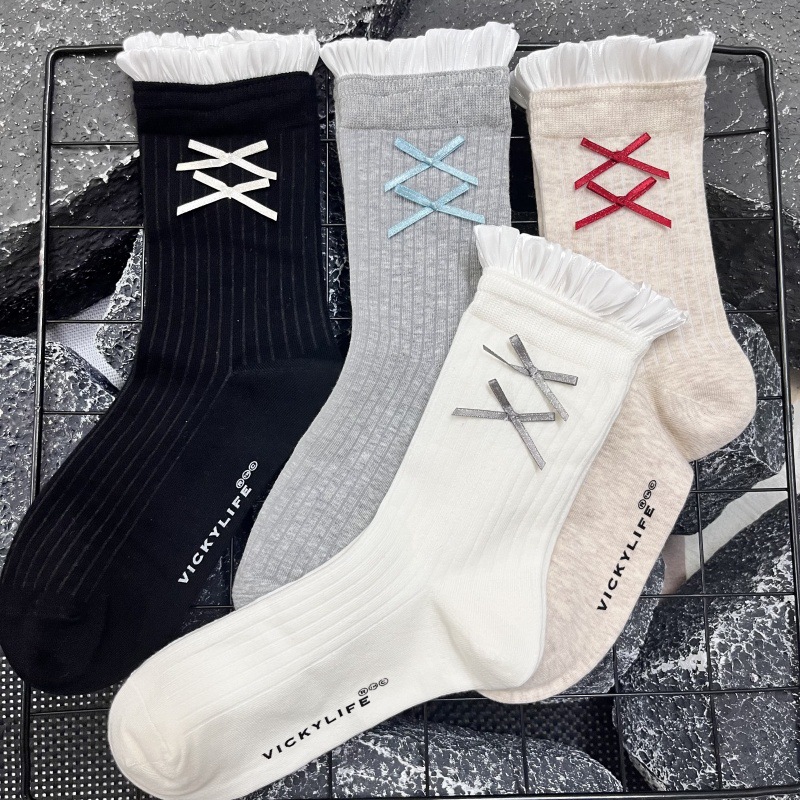 2025秋冬新款棉袜女甜美蝴蝶结泡泡花边潮袜少女风时髦中筒堆堆袜