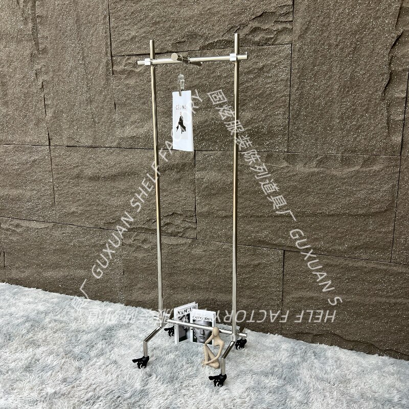 服装店不锈钢可调节高低轮子货架图片