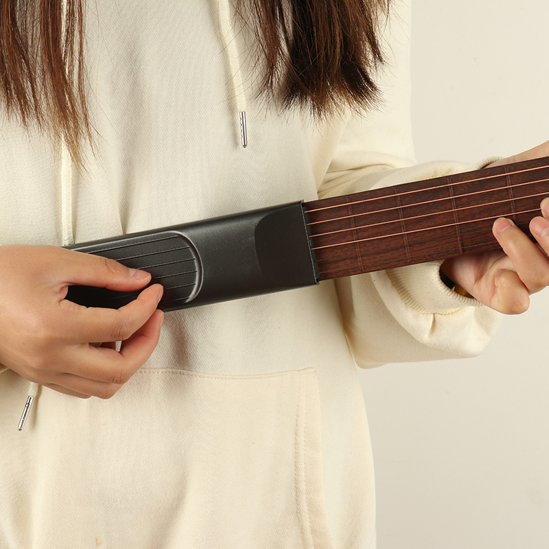 口袋吉他辅助神器女生便携式配件