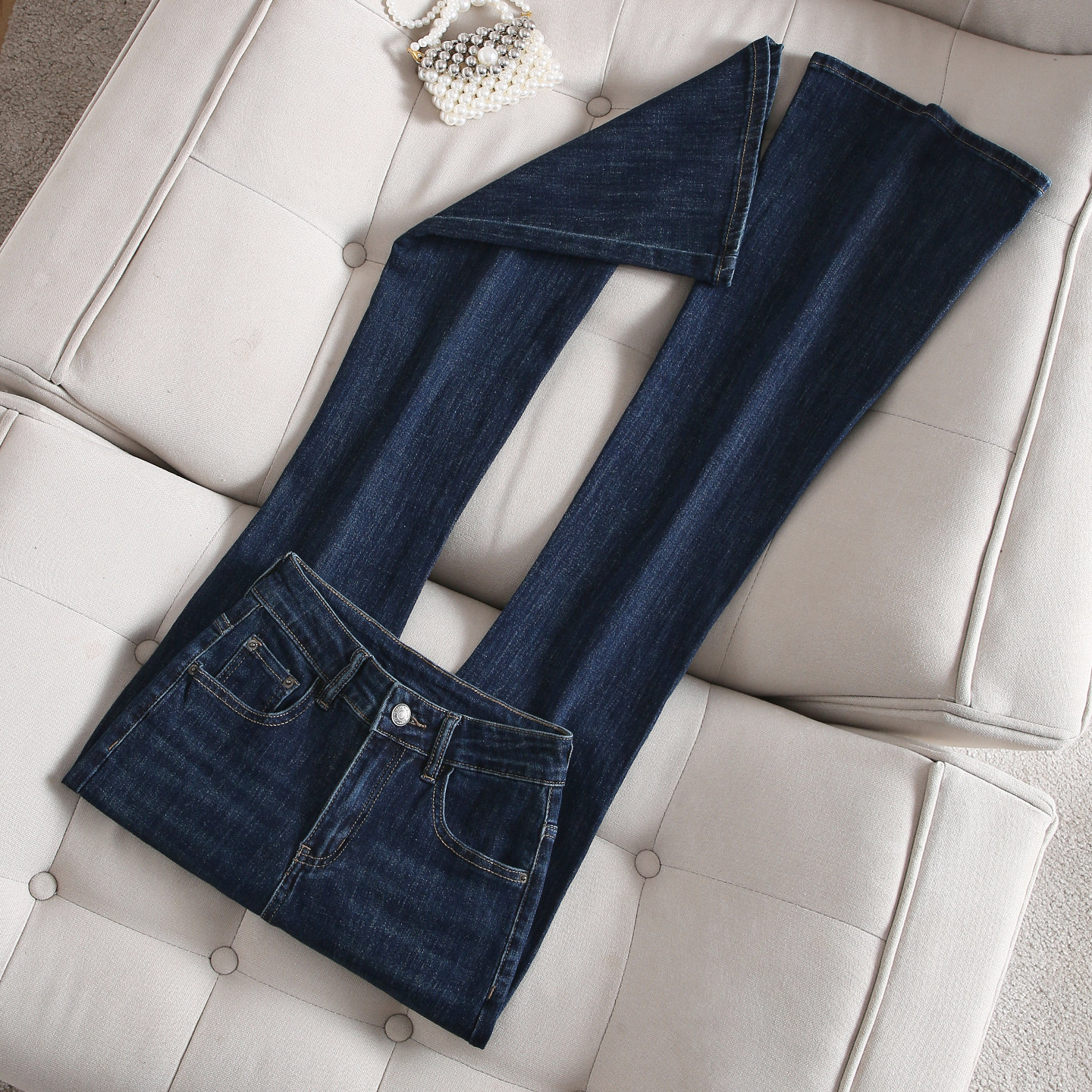 深蓝色紧身微喇牛仔裤女2026早春新款高腰修身显瘦弹力拖地喇叭裤