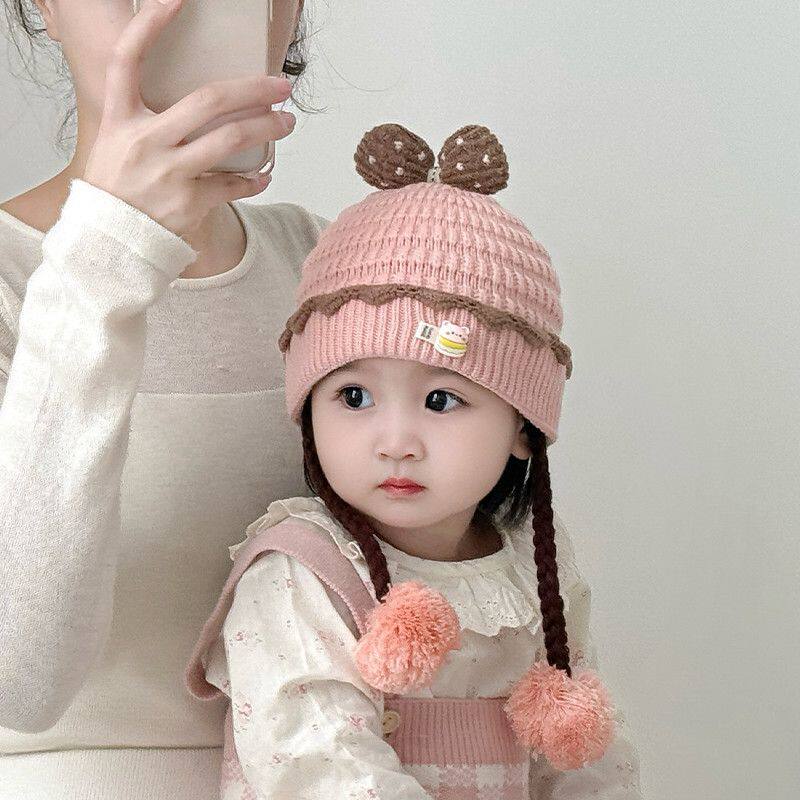 婴儿帽子秋冬季蝴蝶结假发辫子帽韩版可爱超萌保暖针织毛线护耳帽