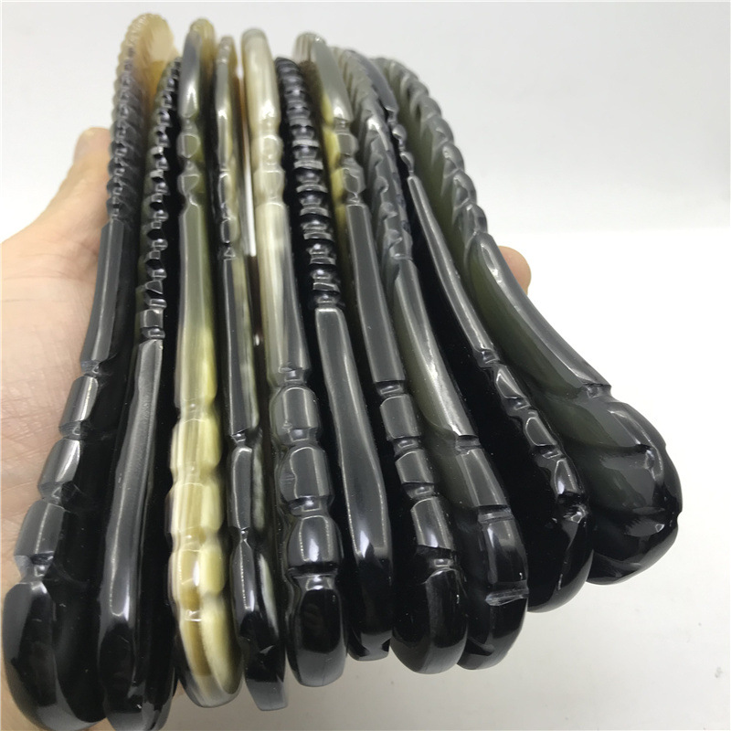 16-18厘米黑花牛角雕刻圆柄梳子密齿气垫防静点气囊黑色套刷