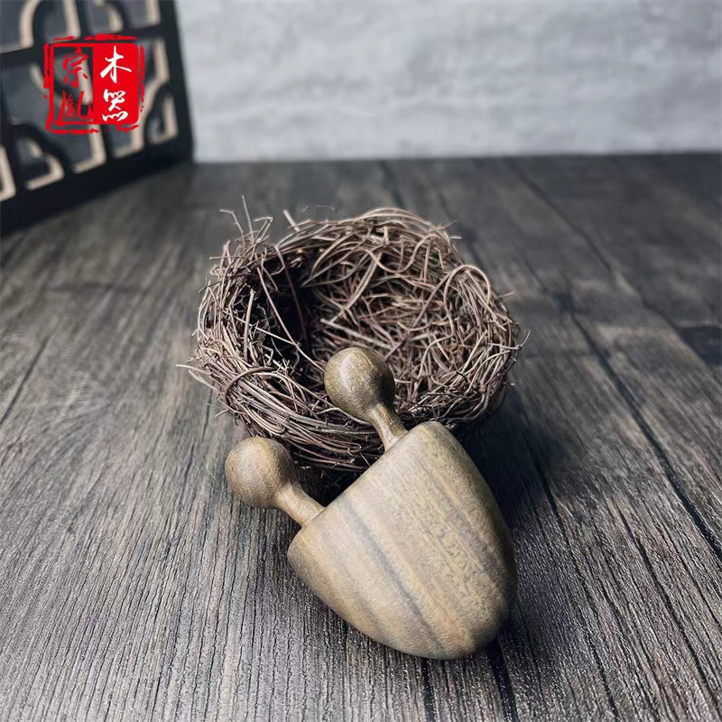 现货绿檀按器檀木质小巧按手把件绿檀两脚按刮痧器鼻刮器