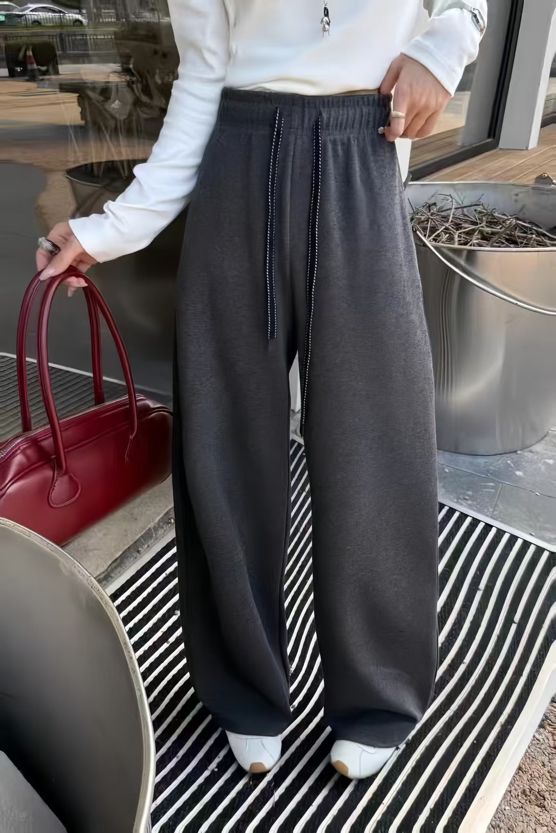 蒂娜2025秋新款时尚百搭松紧腰羊绒抽绳休闲裤女洋气减龄弯刀裤