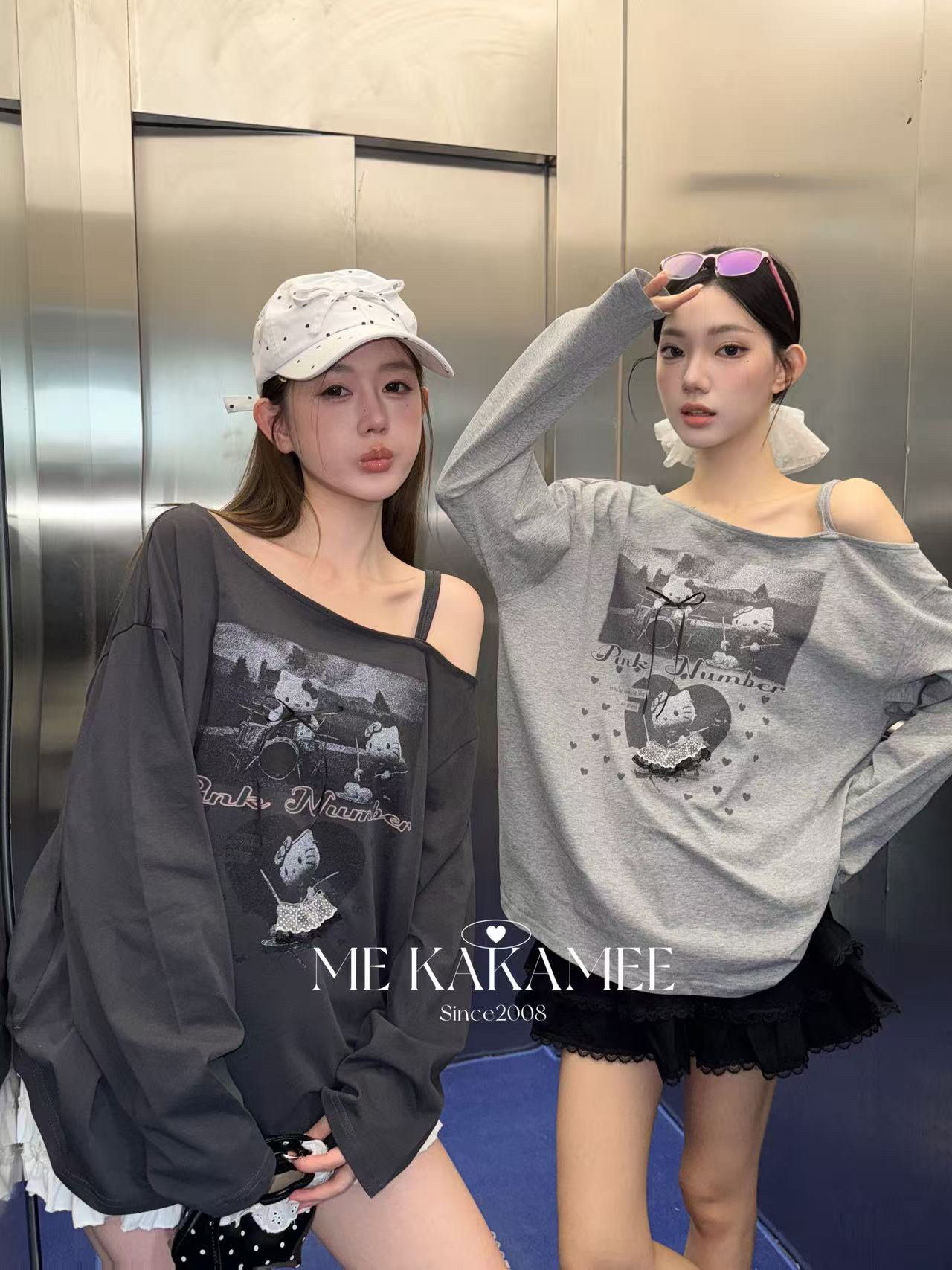 ME KAKAMEE新品喷画爱心KT猫斜肩设计感大版长袖T恤女宽松9620