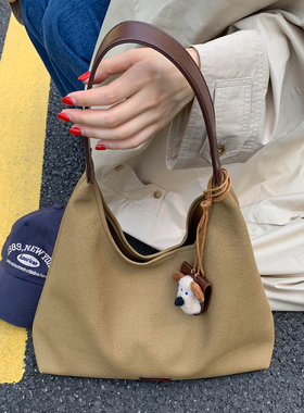 休闲大容量帆布包包女士2026新款时尚百搭单肩腋下包高级感托特包