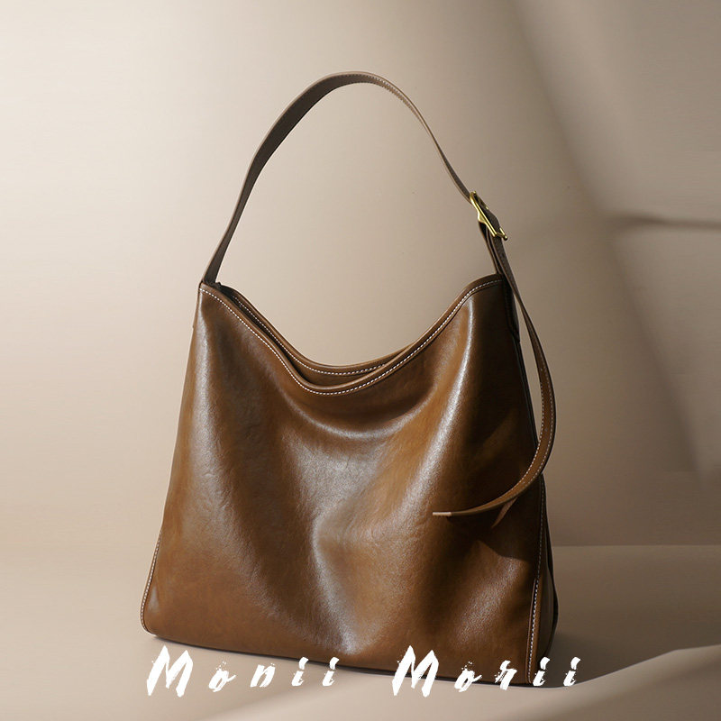 怪兽君小众高级感真皮托特包大容量通勤腋下包复古女大包包百搭潮,箱包皮具/热销女包/男包,托特包,淘宝优惠券,粉丝福利购,淘宝优惠卷