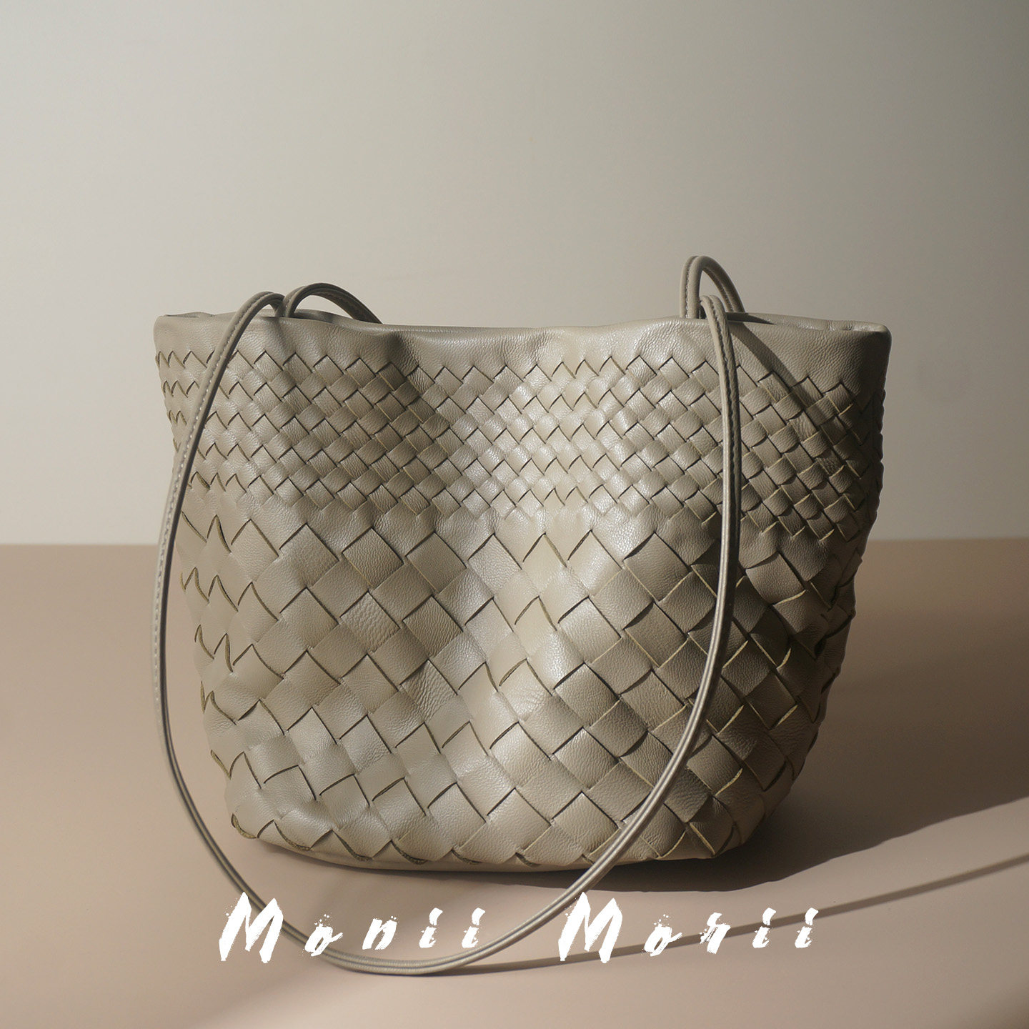 怪兽君小众法式水桶包真皮腋下包羊皮编织单肩包通勤女包包高级感