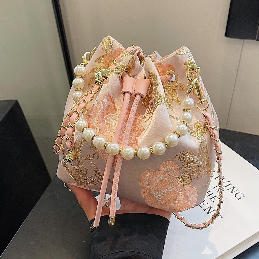 新中式国风包包女2024新款珍珠手提时尚水桶包洋气百搭单肩