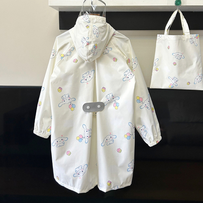 日本出口卡通儿童雨衣外贸出口小学生幼儿园上学带书包位长款雨披