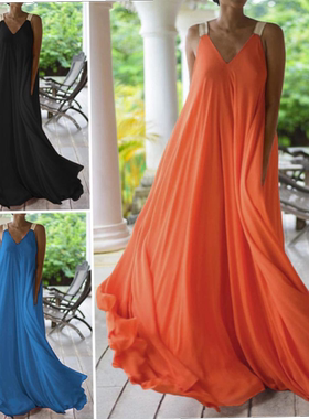 Full length dress with deep V-neck halter and large hem susp