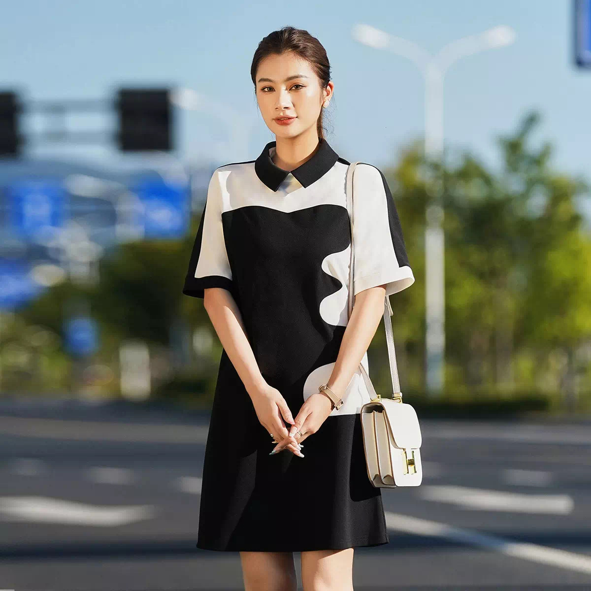 黎姿春夏秋季女士时尚舒适透气都市休闲设计感气质拼色针织连衣裙