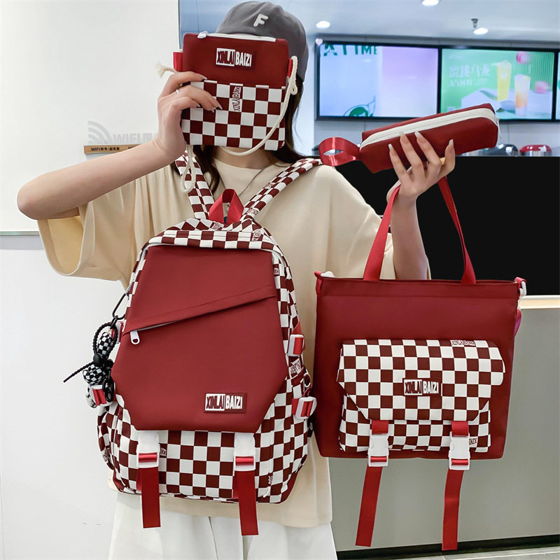 克莱因蓝色棋盘格高初中小学生书包女四件套2022新款原宿风双肩包