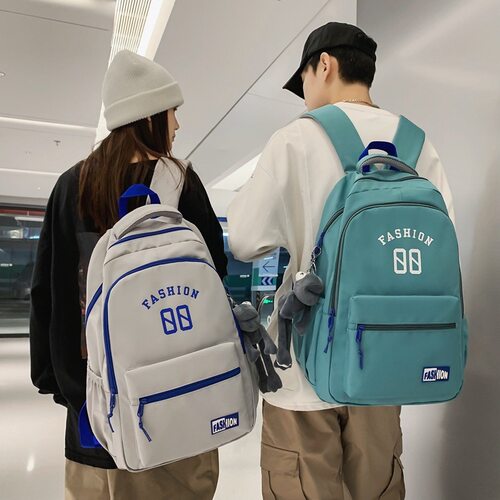 大容量书包男女高中大学生简约休闲旅行背包2024新款中学生双肩包