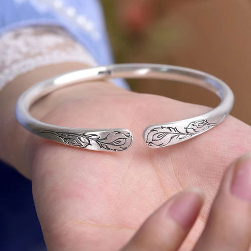 手工錾刻羽毛古法足银999手镯