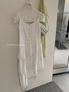 巧巧东大门2026夏季新款韩系吊带连衣裙女不规则斜边蕾丝仙女裙子