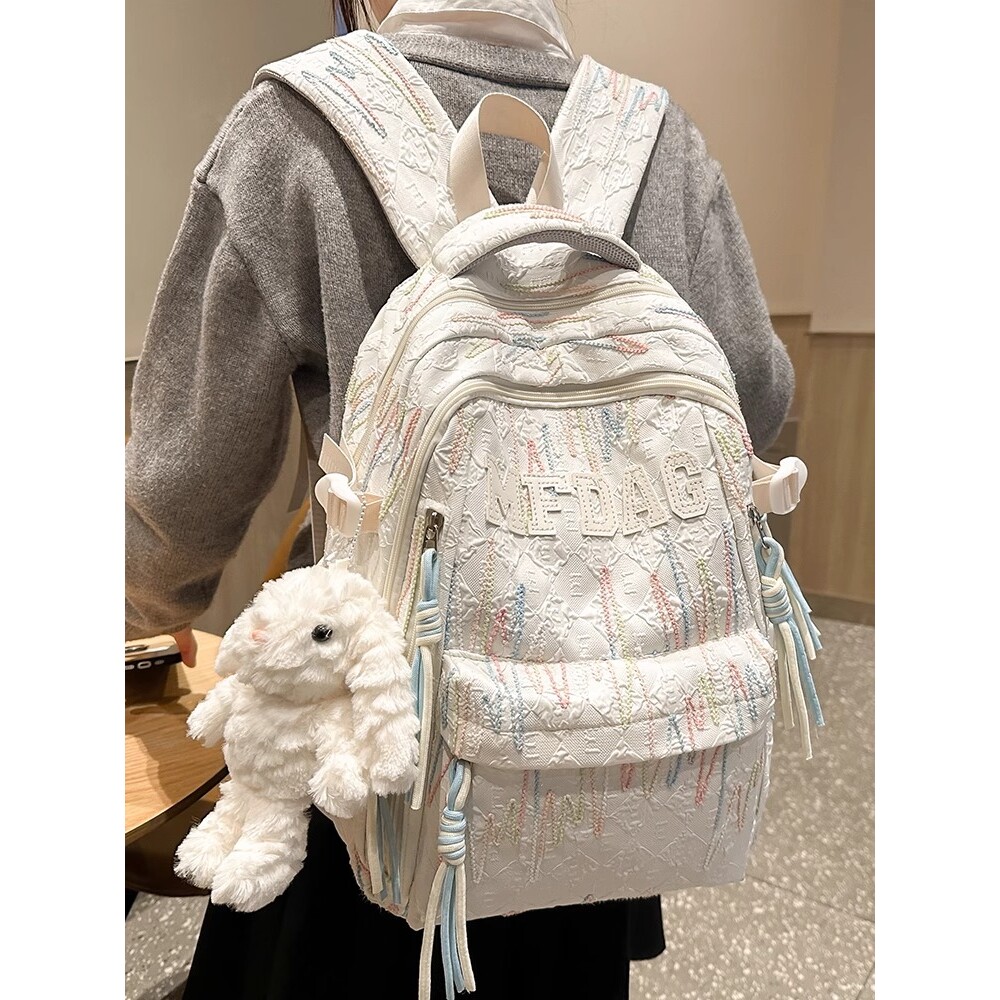日本高颜值书包女初中生简约大容量小学生双肩包大学生设计感背包