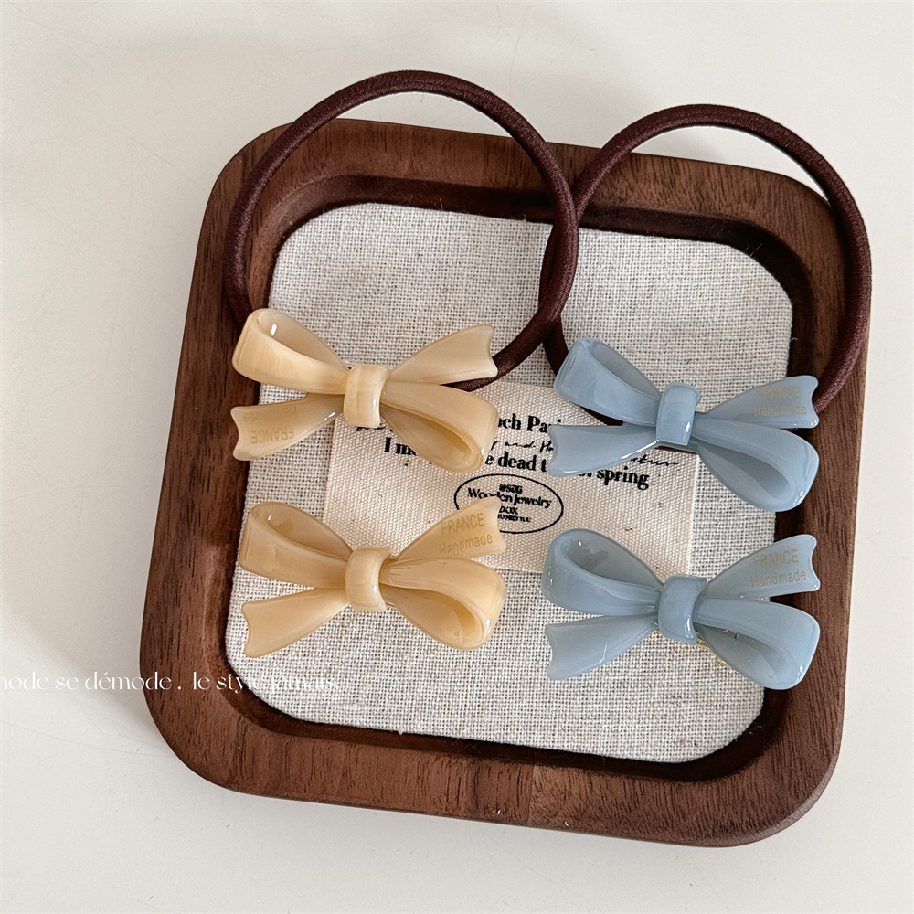 水雾泊蓝温柔奶杏醋酸蝴蝶结发夹