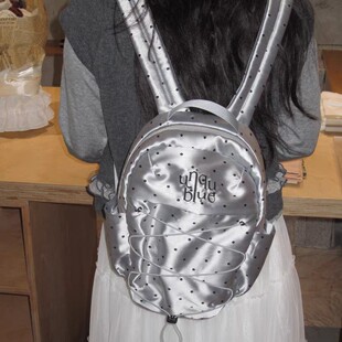 Unique blue甜美千禧氛围感抽绳波点百搭银色精致学生双肩包女