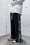 2023春夏季腰果花反光带直筒缩脚宽松青少年运动休闲裤KK38-P45，男装休闲裤，星座101A-1