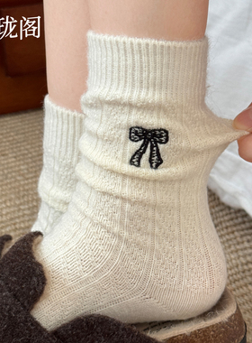 蝴蝶结羊毛袜子女士秋冬白色中筒袜2025新款爆款加厚保暖堆堆长袜