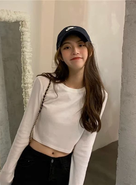 辣妹高腰露肚脐长袖T恤女秋季修身显瘦打底纯欲短款小众内搭上衣