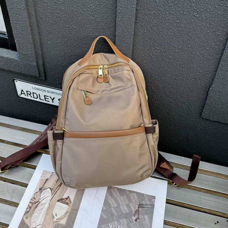 欧货新款时尚百搭多夹层侧袋双肩包女大容量旅行背包休闲运动书包
