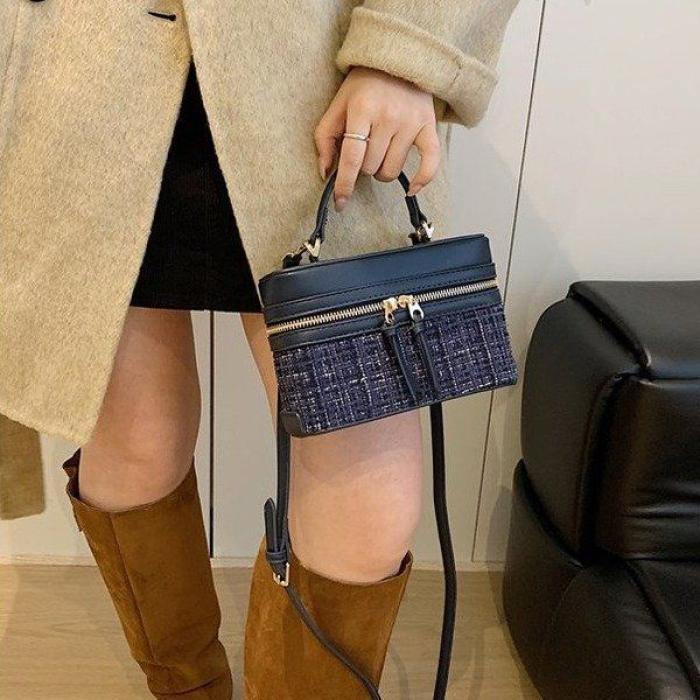 春夏新款女包2025流行手提帆布硬质休闲通勤小方包单肩斜挎水桶包