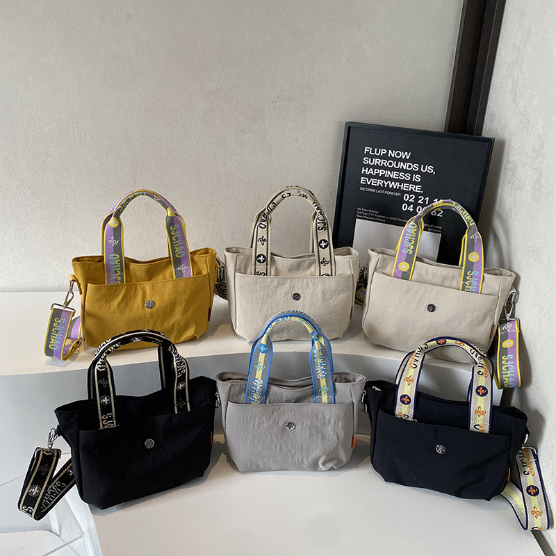 托特包女大容量2026新款斜挎帆布女式通勤高级感百搭单肩手提女包