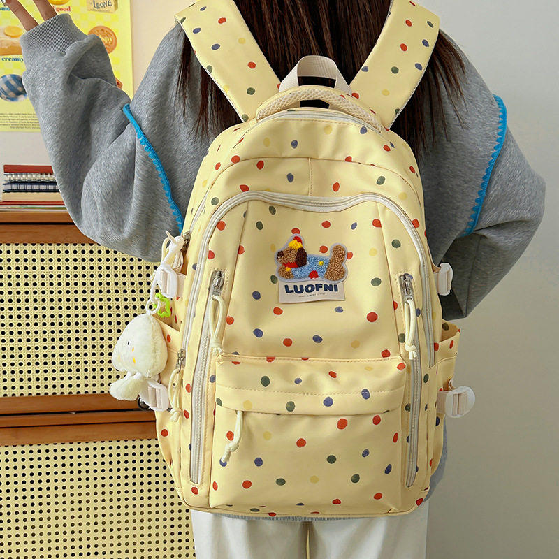 日本小学生初高中学院风波点尼龙双肩包大容量可爱书包男女旅行包