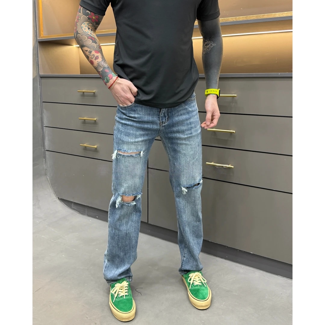春季复古个性新款时尚休闲百搭净版破洞合身小直筒男士牛仔裤925