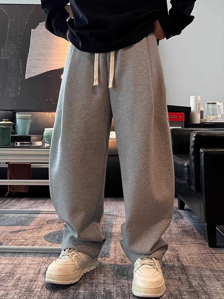 高端垂感宽松弯刀卫裤男士2025秋冬季高级感运动裤慵懒风阔腿长裤