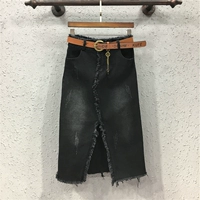 Ins váy denim lửa siêu nữ mùa thu 19 hàng mới châu Âu tua rua căng không đều chia một bước gói hông váy - Váy chân váy bò