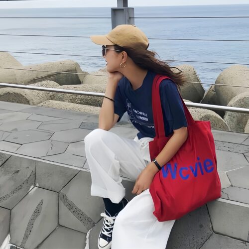 韩版ins同款红色帆布袋休闲字母印花帆布单肩包大容量学生书包