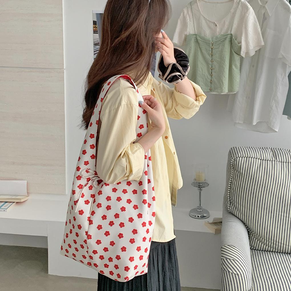 春款韩系碎花背心包女大容量两用双面单肩包上课通勤百搭手提布袋