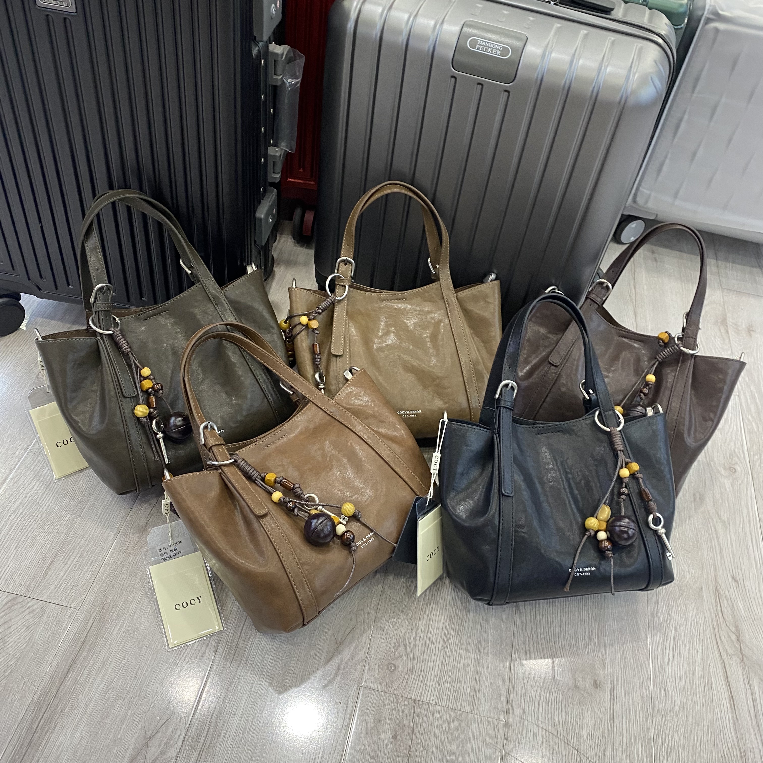 COCY油腊皮新款女包时尚包百搭单肩包腋下包女斜挎包水桶包83363