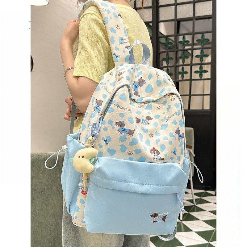 netx Kiss中学生书包蓝色系小众高颜值女生背包可爱腊肠狗双肩包