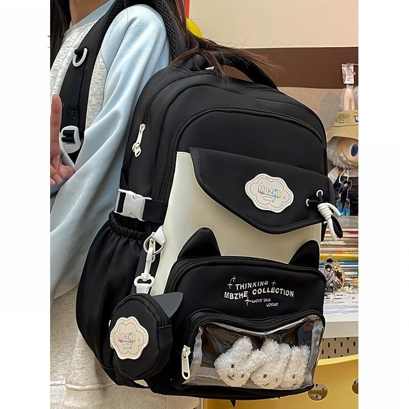 netx Kiss学生书包小学生黑色耐脏大容量背包初中生高颜值双肩包