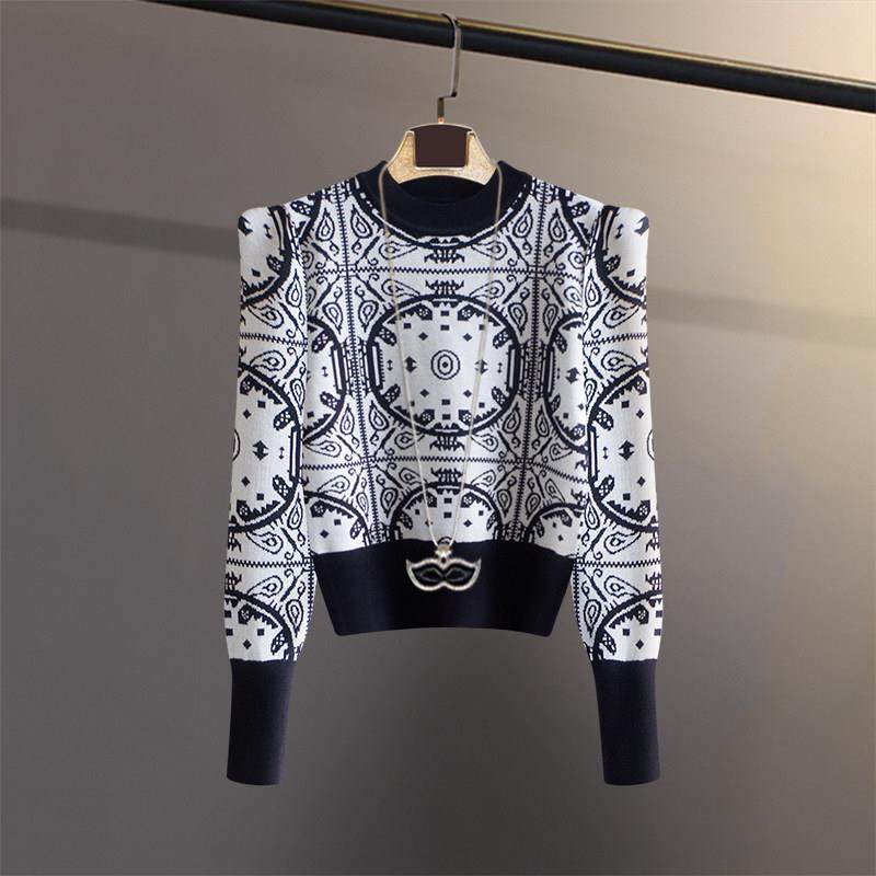 潮牌2024春秋冬季复古小众设计感针织衫女毛衣短款高腰泡泡袖上衣