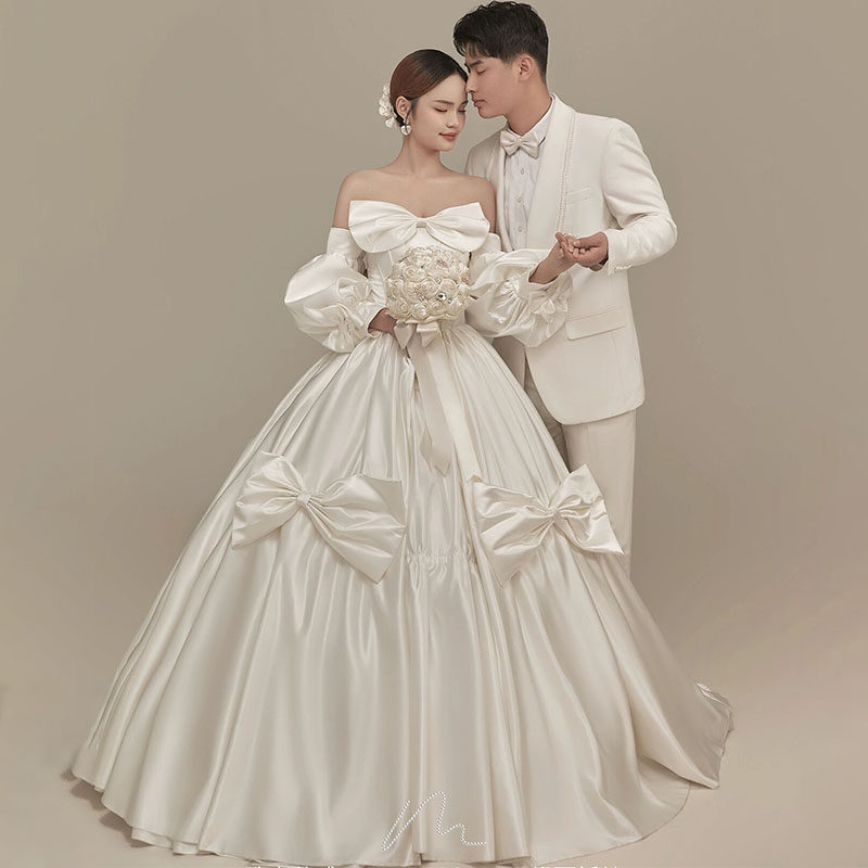 影楼主题韩式缎面婚纱照摄影情侣旅拍照写真蝴蝶结公主蓬蓬裙礼服