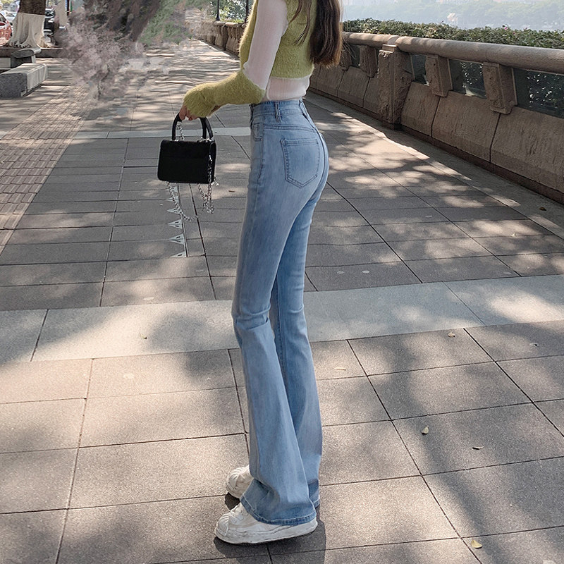 品牌折扣正品女装断码清仓特价不能退换浅蓝色微喇叭牛仔裤女春