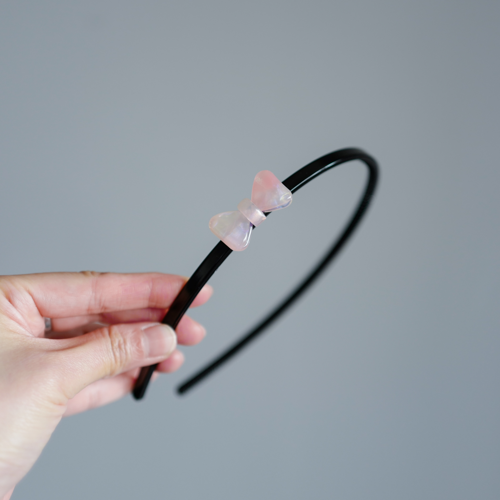 高级感醋酸渐变粉蝴蝶结儿童有齿防滑碎发箍小学生带齿头箍发窟