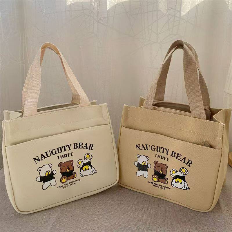 帆布手提包宝妈外出简约小巧立体拎包通勤加厚上班便当饭袋高颜值