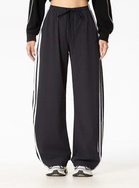 Adidas阿迪达斯女三条纹舞动防晒休闲运动裤香蕉裤梭织长裤KX6695