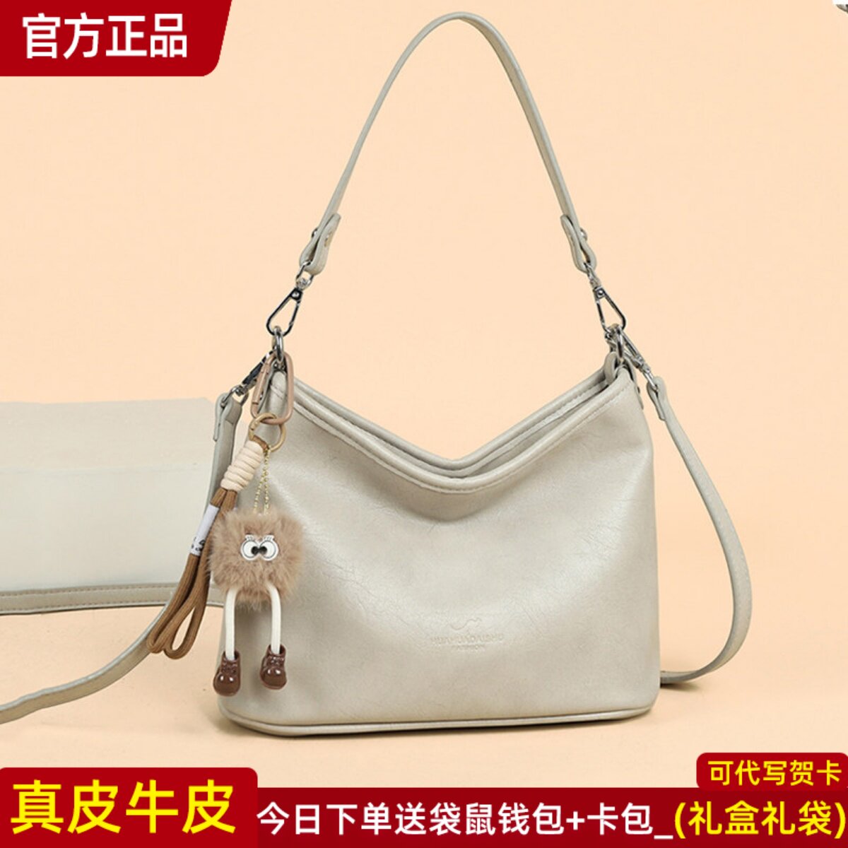 袋鼠正品真皮女包牛皮斜挎包图片